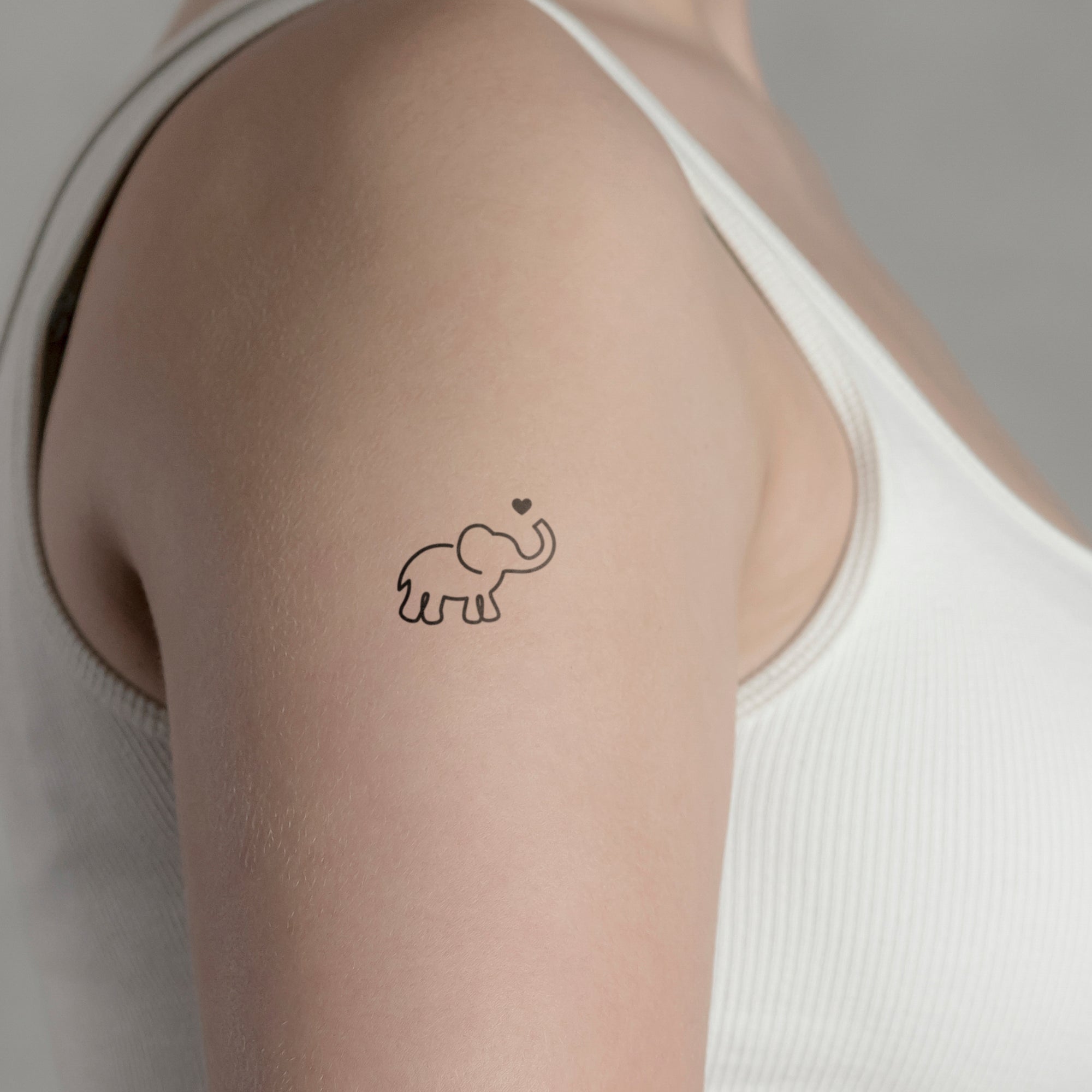 Kleiner Elefant Tattoo von minink, der Marke für temporäre Tattoos.