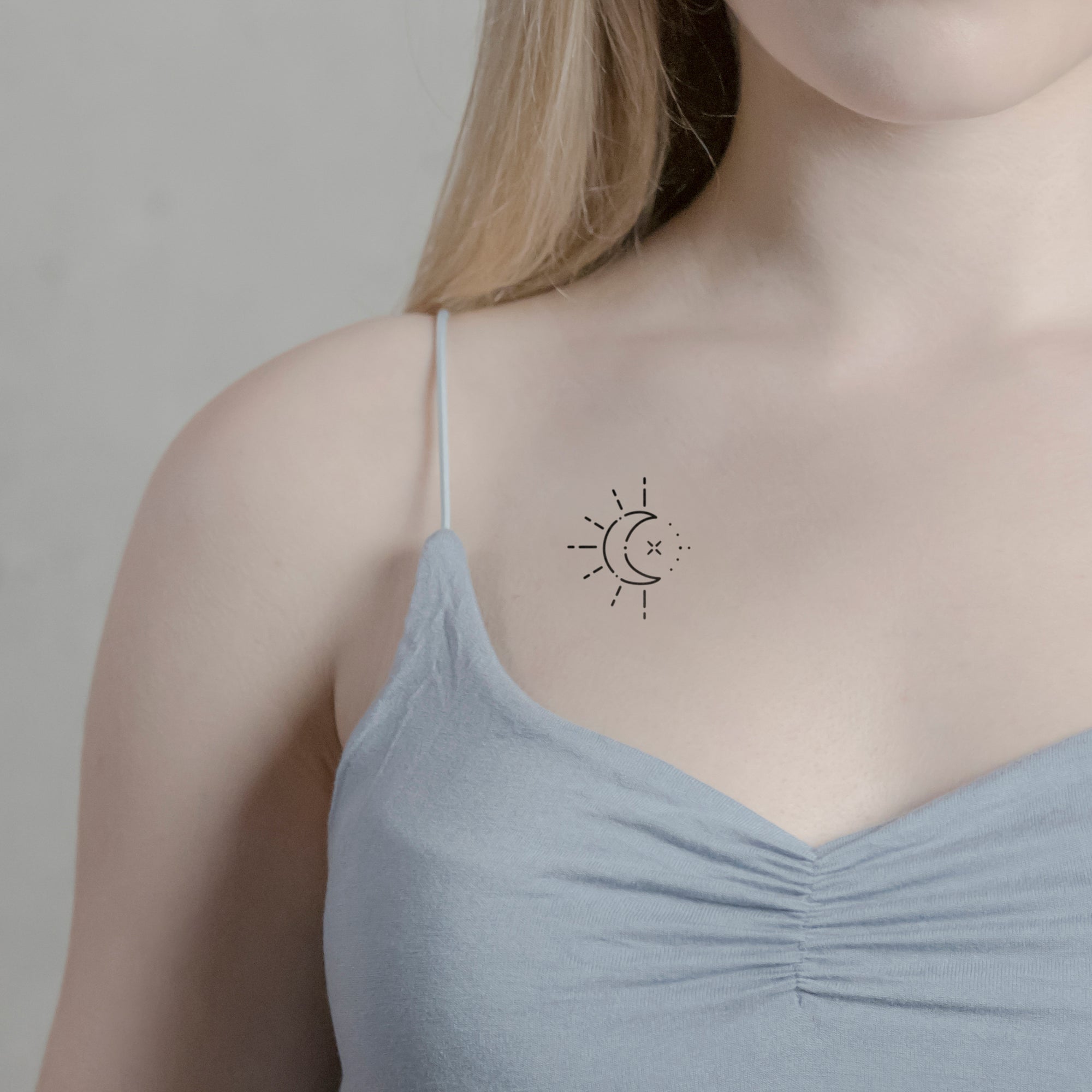 Sonne & Mond künstlerisch Tattoo von minink, der Marke für temporäre Tattoos.