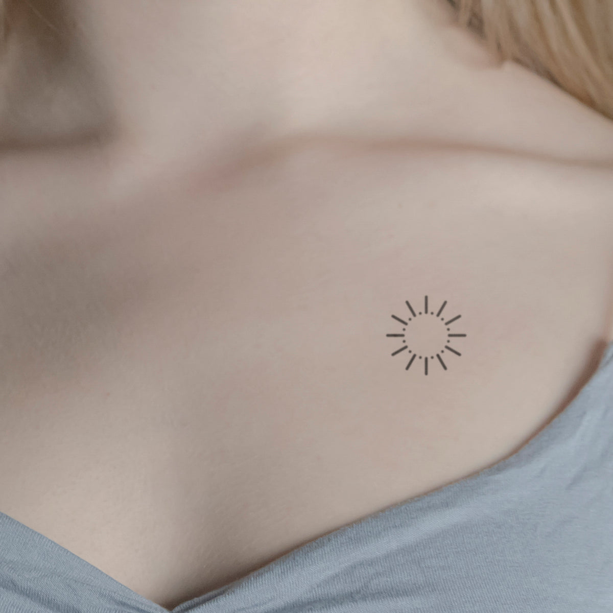 Simple Wave and Sun Tattoo on Shoulder by Vinicius Rosa