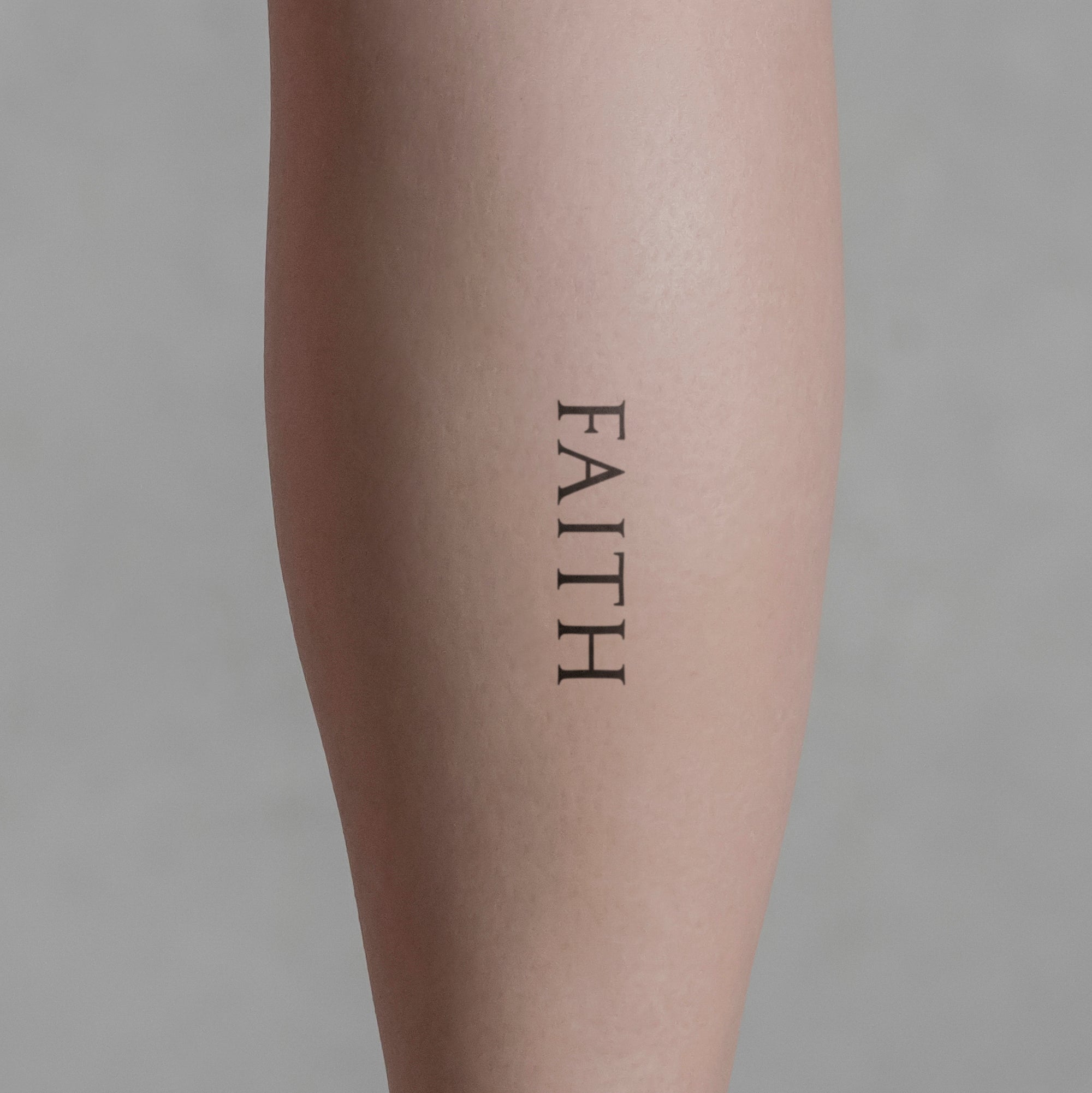 Schriftzug Tattoo FAITH von minink, der Marke für temporäre Tattoos.