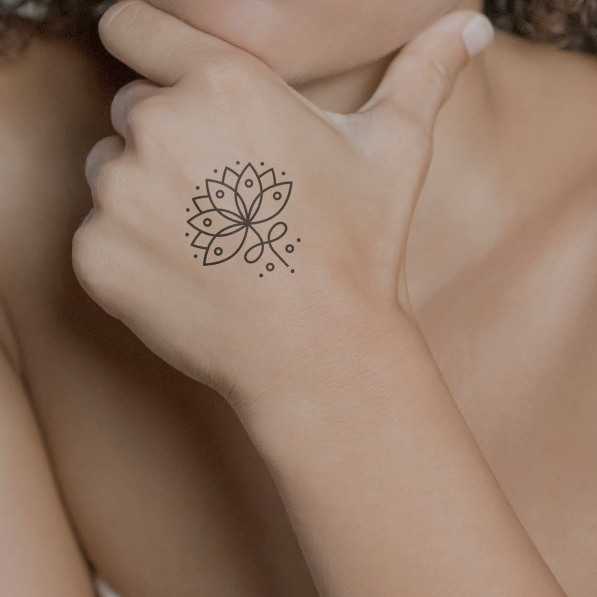Lotus flower temporary tattoo located on the inner
