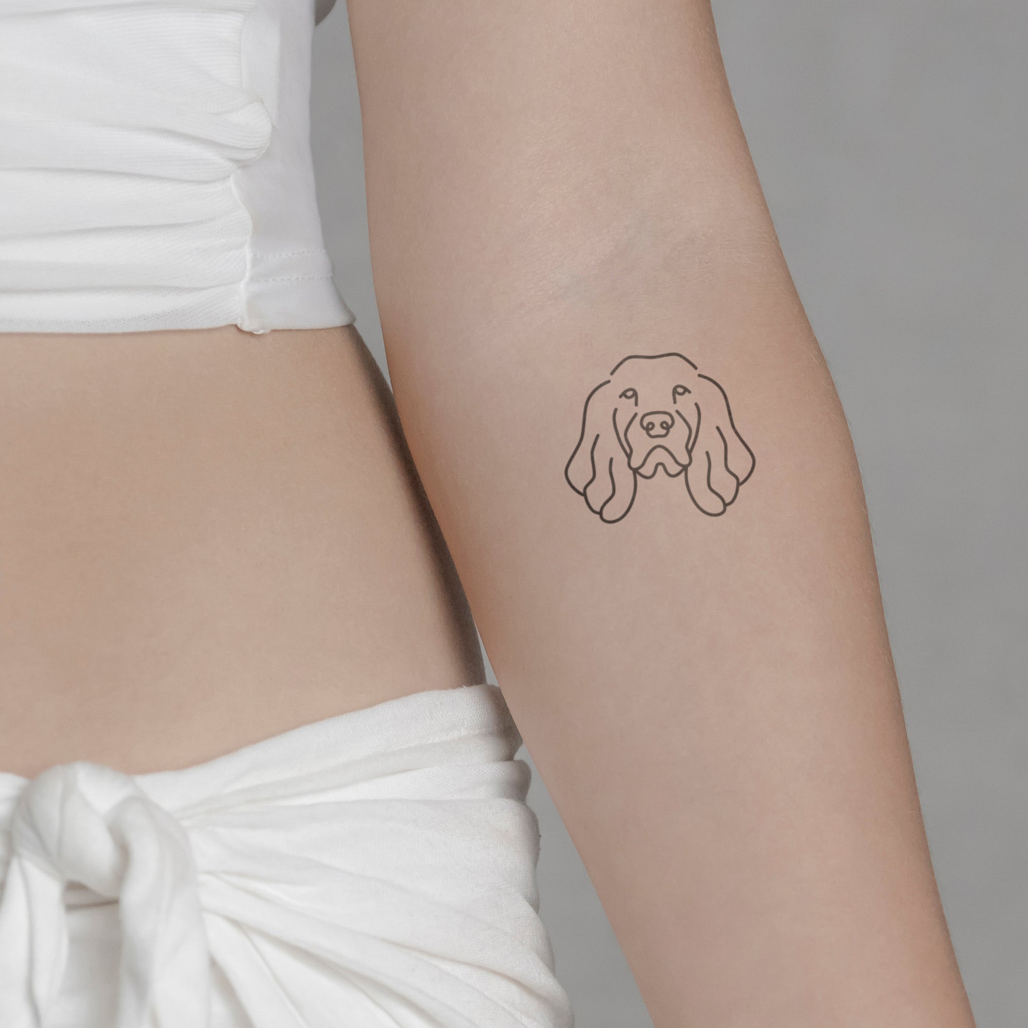 Hund: Dackel Tattoo von minink, der Marke für temporäre Tattoos.