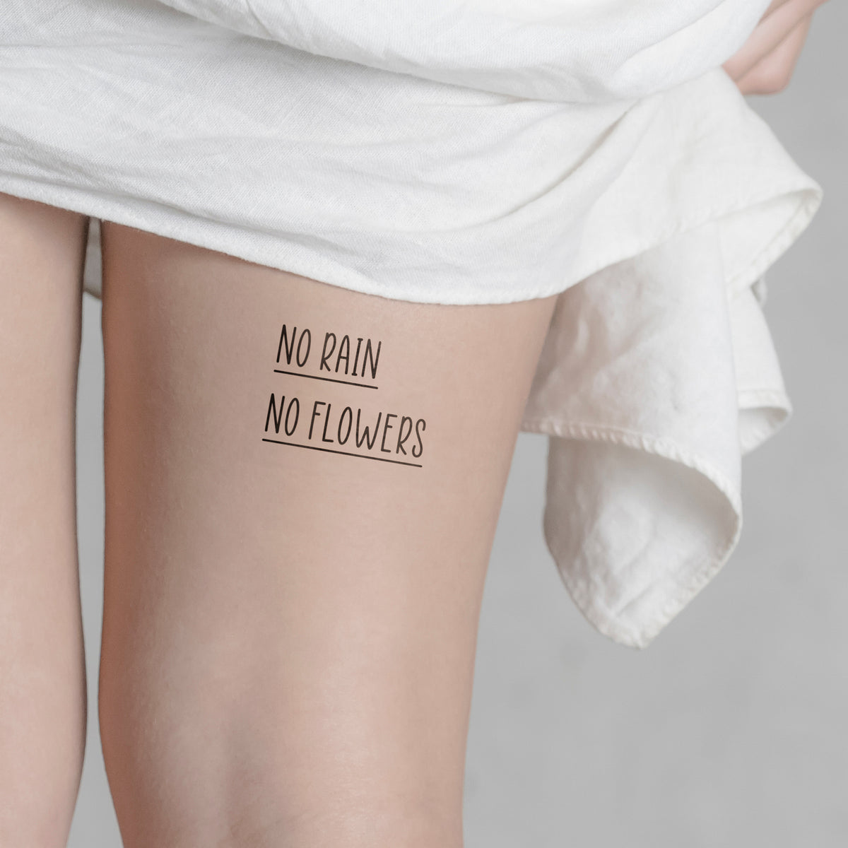 NO RAIN NO FLOWERS 2 Tattoo von minink, der Marke für temporäre Tattoos.